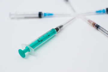 Fototapeta premium Syringes on white different sizes