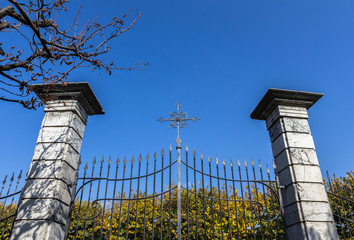 Iron gate with cross