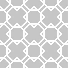 Gray and white geometric ornament. Seamless pattern