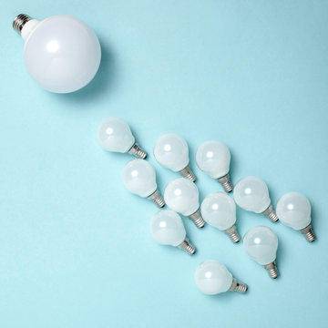 One light bulb outstanding,glowing different.business creativity idea concepts.flat lay design