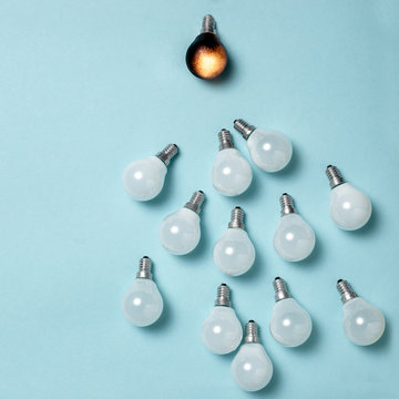 One light bulb outstanding, glowing different. Business creativity idea concepts.