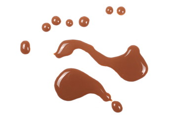 Spilled chocolate milk puddle isolated on white background, top view