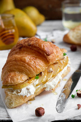 croissant with pear, cream cheese and honey