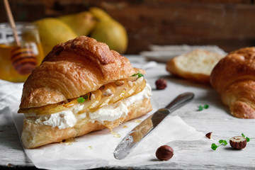 croissant with pear, cream cheese and honey