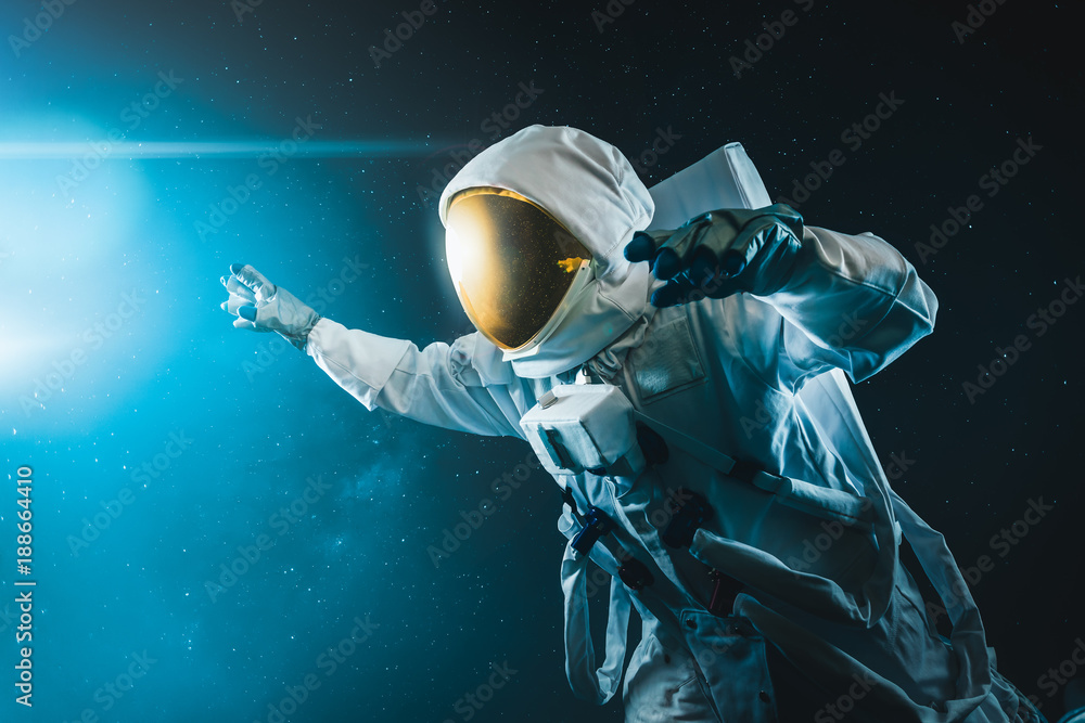 Canvas Prints astronaut floating in outer space , high contrast image