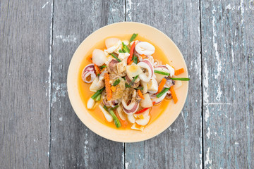 Stir fried squid with salted egg yolk, Thai seafood cuisine