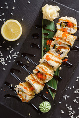 sushi on the black background