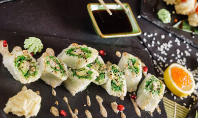sushi on the black background