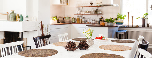 banner of a ktichen table with placemats and kitchen unfocused in the background