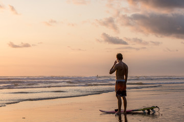 Surfing the waves of Indonesia beach