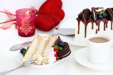 Piece of layer cake with fresh berries.