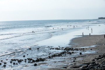 People at beach setting
