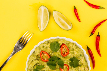 Vegetarian Mexican Style Guacomole Food Dip With Red Chillies