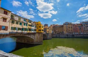 Fototapeta na wymiar FLORENCE (FIRENZE), JULY 28, 2017 - View of Ponte Vecchio in Florence (Firenze), Tuscany, Italy.