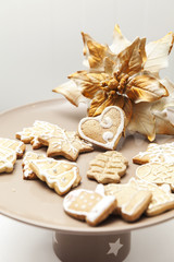 gingerbread cookies on a plate with Christmas motifs