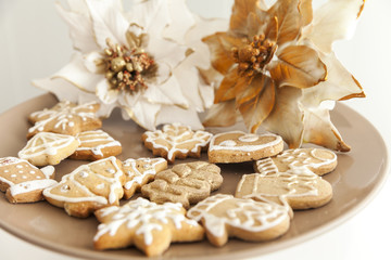 gingerbread cookies on a plate with Christmas motifs
