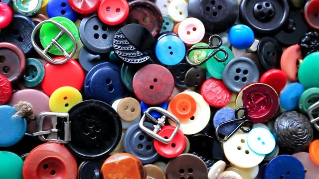 Long ago they decorated costumes and dresses. Buttons of different colors, from big to small, buckles and hooks, they got worn out and become unnecessary.