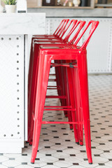 Modern metal red chair with marble counter