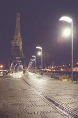 Szczecin (Stettin) City boulevards at night, vintage toned picture with lens flare, Poland. © MaciejBledowski