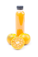 .Orange juice in plastic bottle and ripe shogun orange isolated on white background.