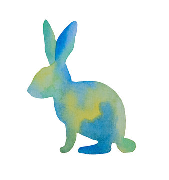 Beautiful silhouette of an easter rabbit of blue and green painted watercolor on a white background
