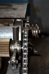 Professional machinist. Horizontal shot of a man operating lathe grinding machine metalworking industry concept copyspace.  Cropped shot of a industry worker at his workshop