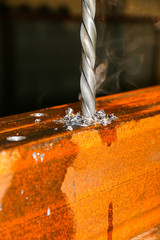 Horizontal shot of a man operating lathe grinding machine metalworking industry concept copyspace. Metal production. Cropped shot of a industry worker at his workshop operating lathe grinding machine.