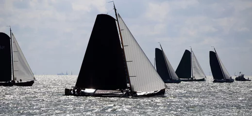 Photo sur Plexiglas Naviguer Traditional Frisian wooden sailing ships in a yearly competition on the Ijsselmeer, The Netherlands