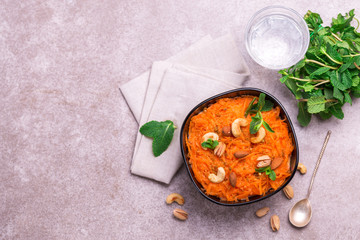 Indian carrot Gajar halwa. Copyspace, top view, flatlay.