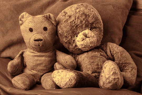 Grandparents vintage teddy bear lovers. Old-aged toy married couple in love. Wedding anniversary or valentines day image.