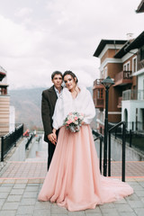 modern wedding in the mountains in Sochi and the sea, a wedding in a European style by car.