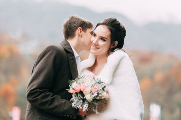 modern wedding in the mountains in Sochi and the sea, a wedding in a European style by car.