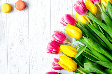 flowers spring tulips top view on wooden background mockup