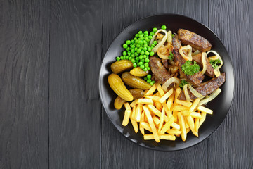 tasty fried veal liver and vegetables