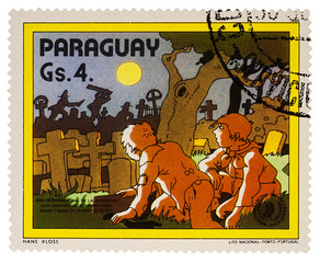 Tom Sawyer and Huck Finn at the cemetery on postage stamp