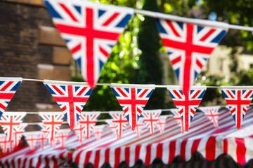 Strings of Union Jack bunts festive decoration in London England UK
