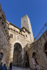 Fototapeta premium Arch and Tower of the Becci, San Gimignano, Siena, Tuscany, Italy