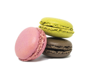 Delicious three multicolored macaroon on a white background