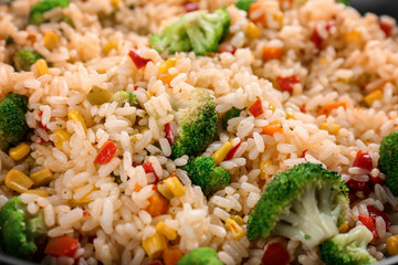 Delicious rice pilaf with broccoli, closeup
