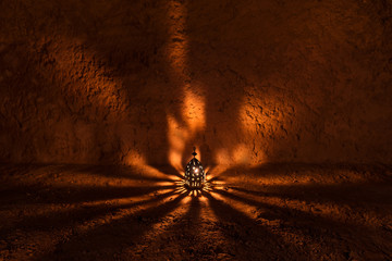 Arabic lamp with beautiful lights in the background. Vintage lantern © GavranBoris