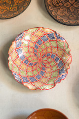 Traditional arabic handcrafted, colorful decorated ceramic for sale at the market in Marrakesh, Morocco, Africa