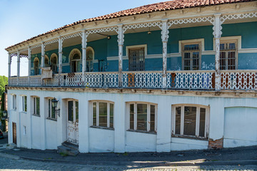 Houses in Tbilisi, Georgia, yellow house with blue balconies. Houses in Tbilisi, Georgia.