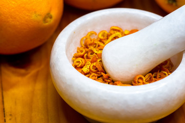 White marble mortar with the orange zest