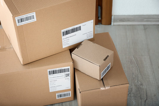 Delivered parcels on floor indoors