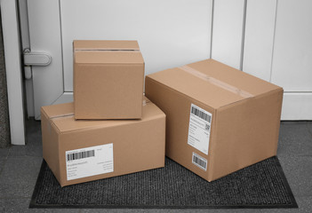 Delivered parcels on floor near front door