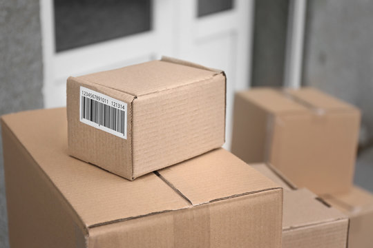 Many delivered parcels outdoors, closeup