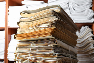 Stack of old documents in archive