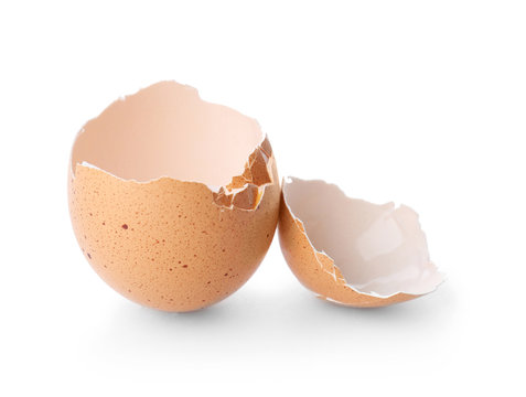 Cracked egg shell on white background