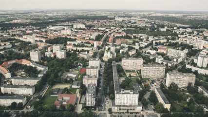 Fototapeta premium Panorama from great height to residential buildings and roads Wroclaw. Photo in retro style