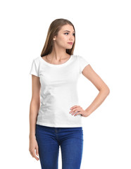 Fototapeta premium Young woman in t-shirt on white background. Mockup for design